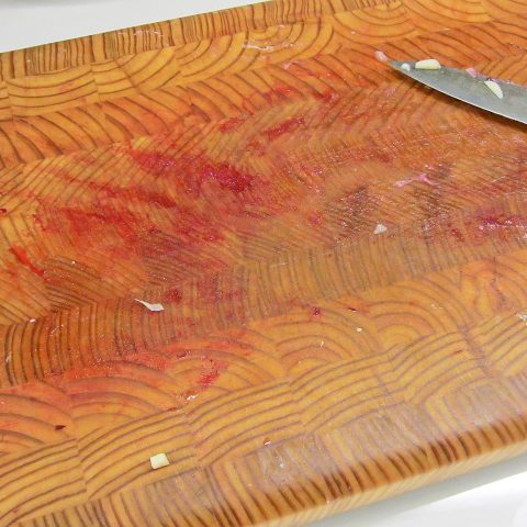 Beet juice on cutting board.