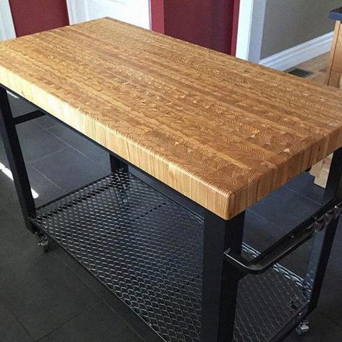 A beautiful little cutting work surface made for a food cart.