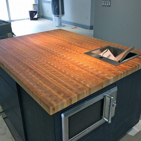 A large custom made island countertop .