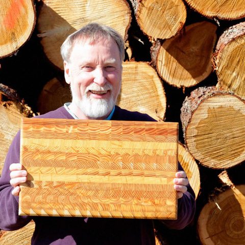 Another beautiful handcrafted Larch Wood cutting board.