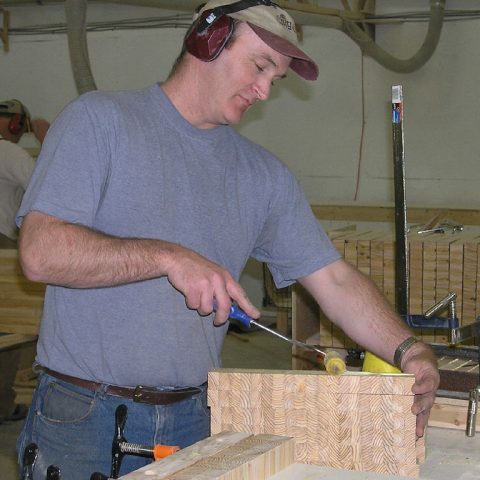 Gluing together end grain blocks for our quality cutting boards.
